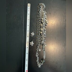 Faux pearl, crystal bead and silver necklace and pierced earrings.